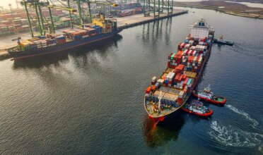 Container ship arrives at port.