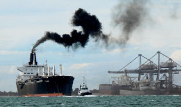 Ship maneuvering out of Port S.Louis du Rhone, near Marseille.